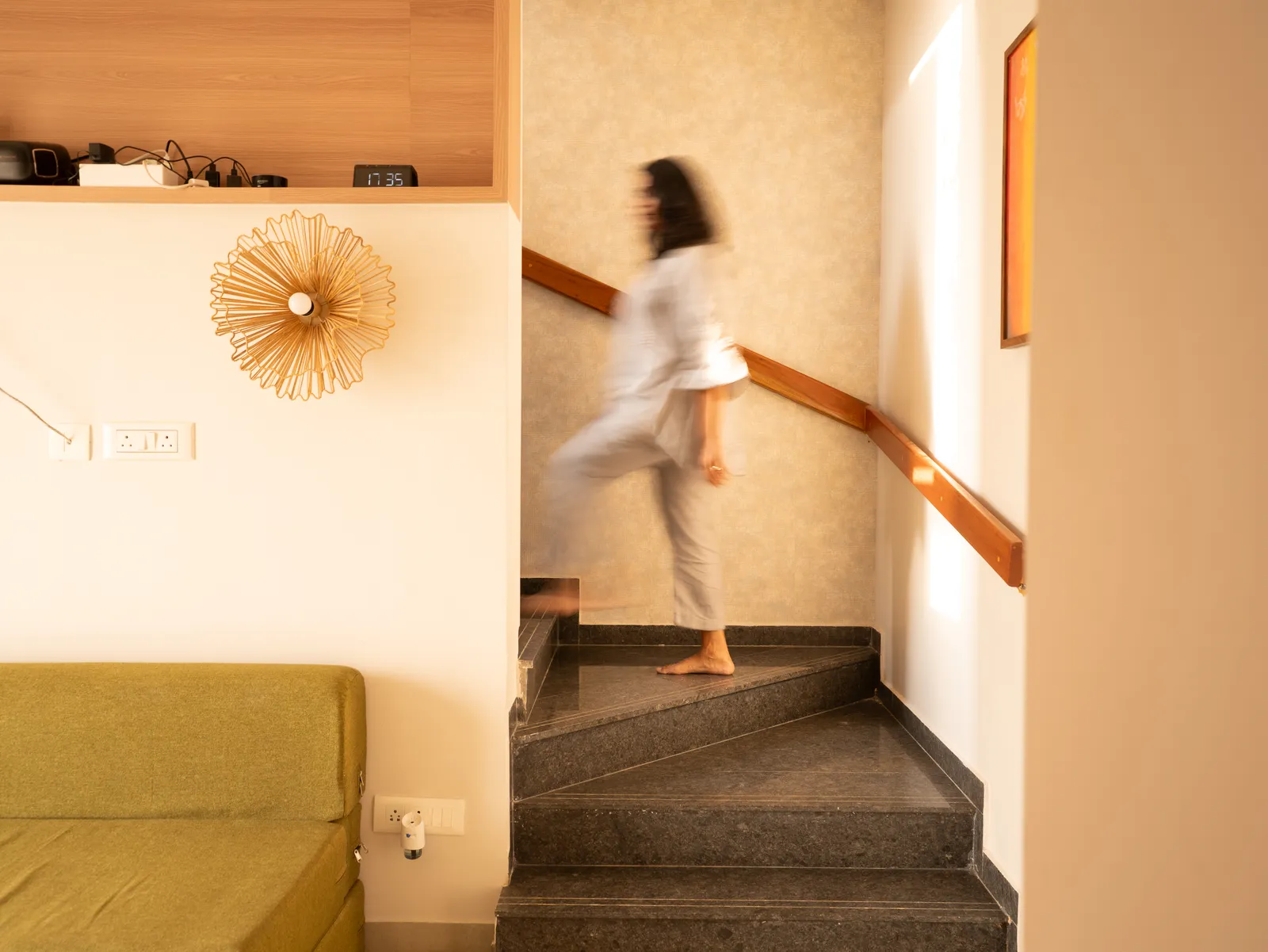Staircase with timber handrail beside the study — Amlan's Residence